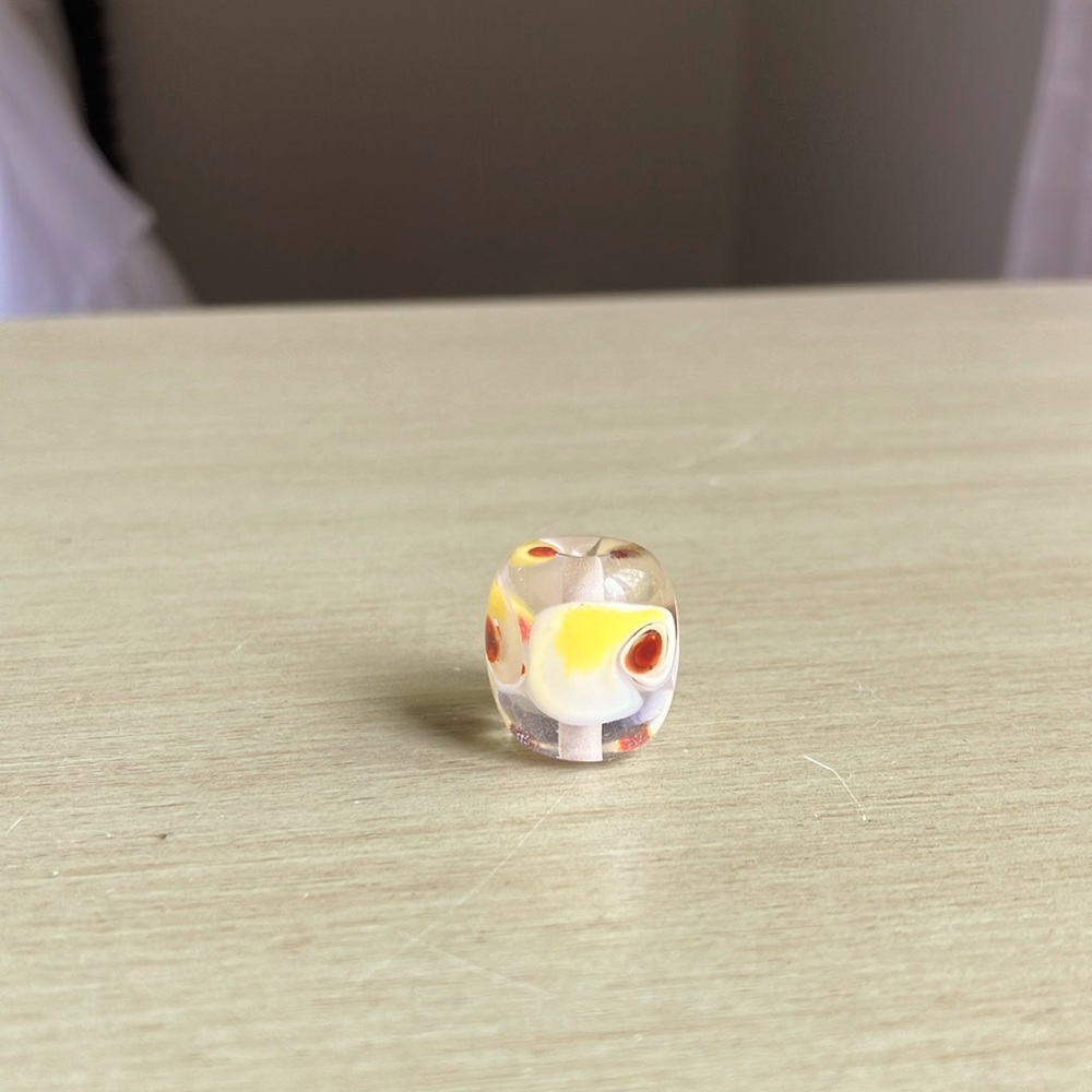 Hand made glass bead for cord or chain.